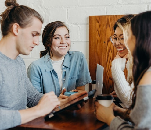 A group of students discussing something