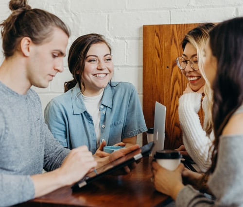 A group of students discussing something