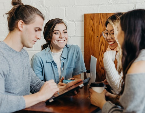 A group of students discussing something