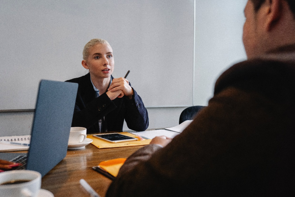 An employee speaking with a manager