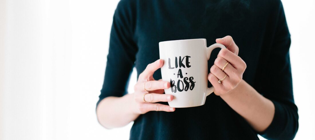 woman with a mug that says "like a boss"