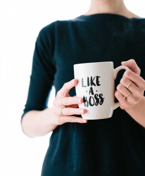 woman with a mug that says "like a boss"