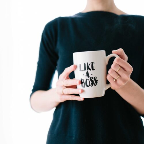 woman with a mug that says "like a boss"