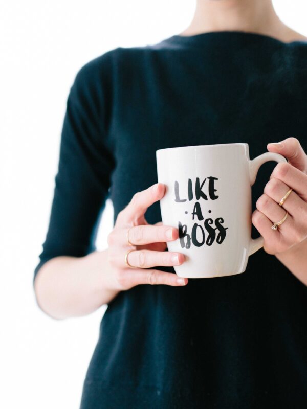 woman with a mug that says "like a boss"