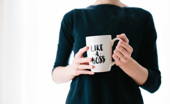 woman with a mug that says "like a boss"