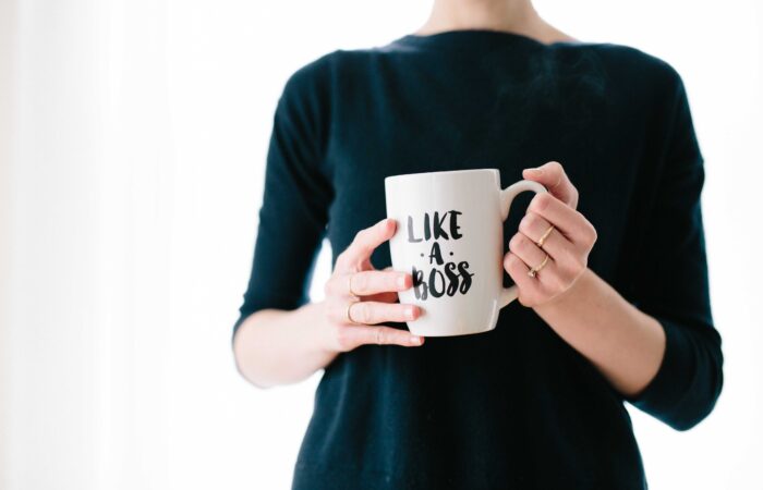 woman with a mug that says "like a boss"