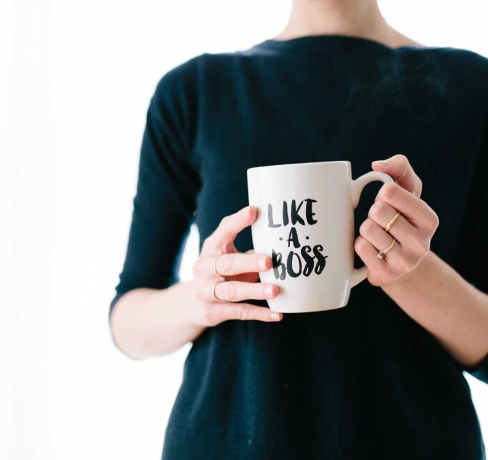 woman with a mug that says "like a boss"