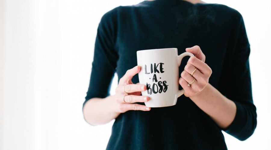 woman with a mug that says "like a boss"