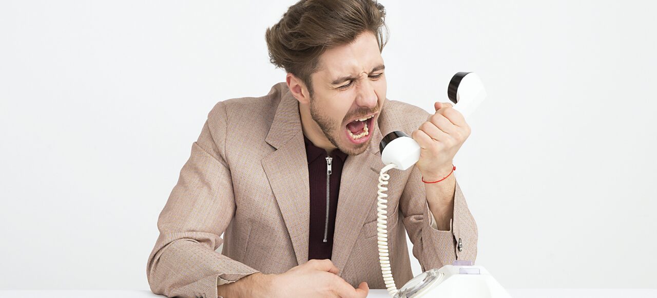 a customer that needs de-escalation; man screaming through phone