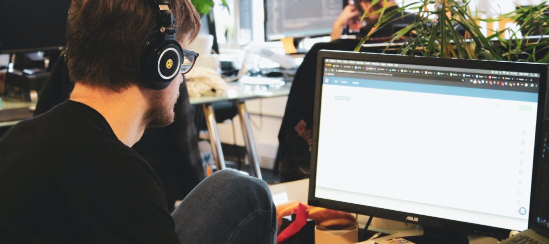 employees working in an open-concept office