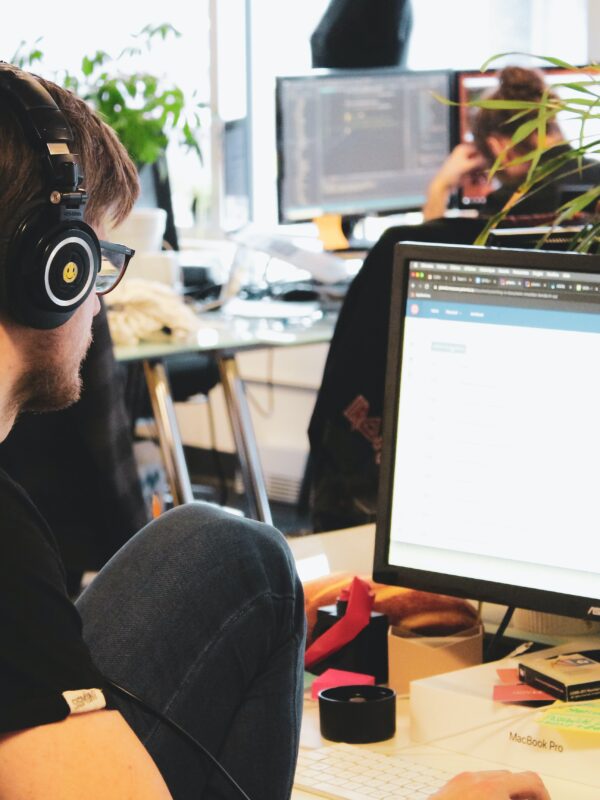 employees working in an open-concept office