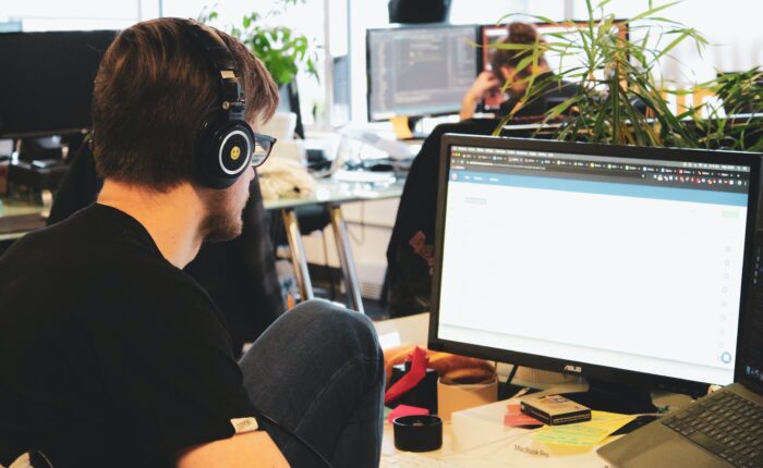 employees working in an open-concept office