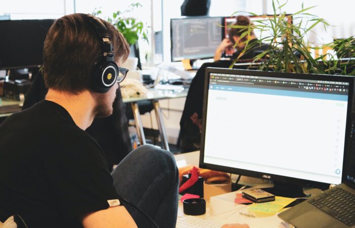 employees working in an open-concept office