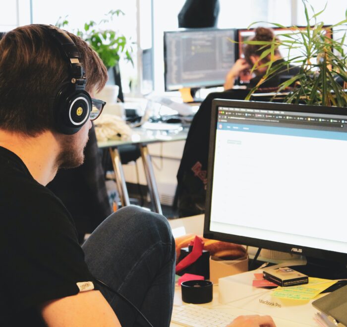 employees working in an open-concept office