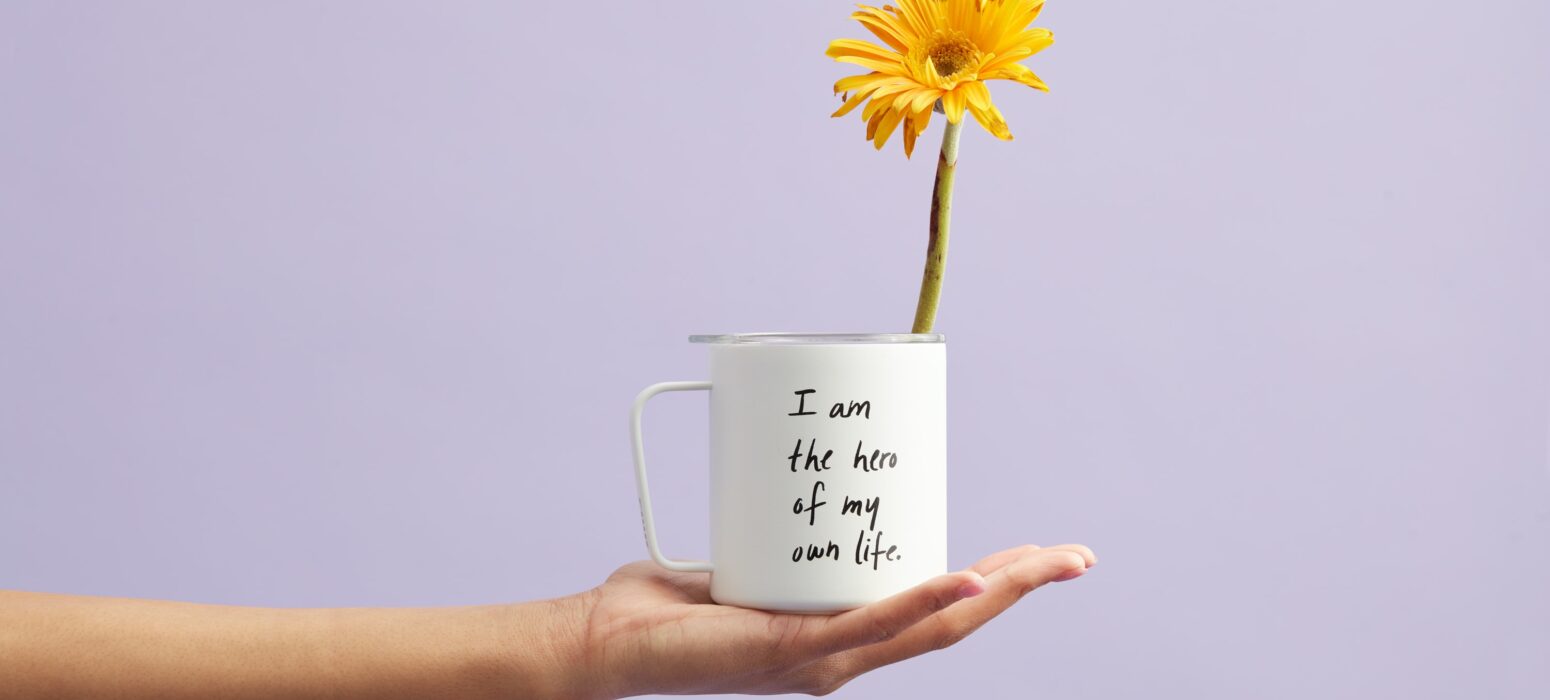 a mug that says I am the hero of my own life