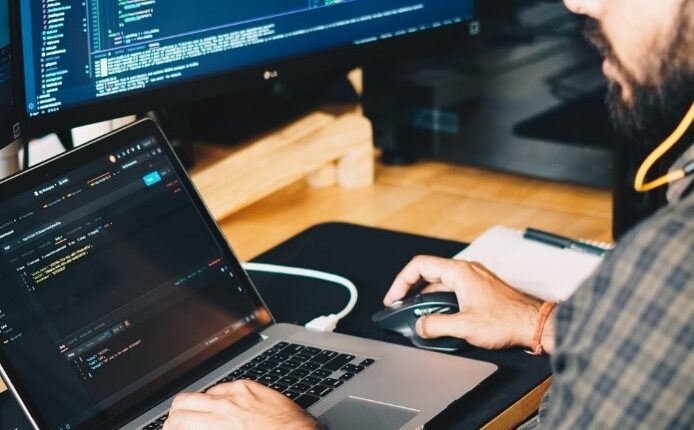 A person working on their computer.