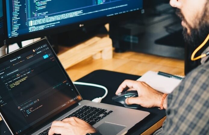 A person working on their computer.