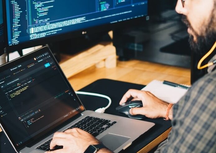 A person working on their computer.