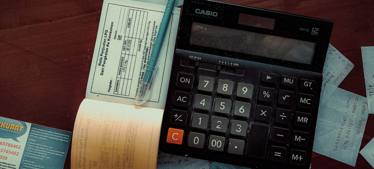 calculator, check book, and other accounting items