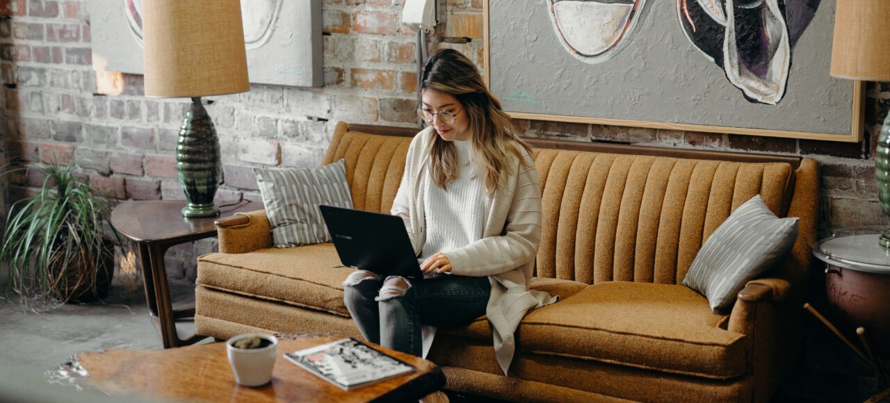 woman typing on a laptop