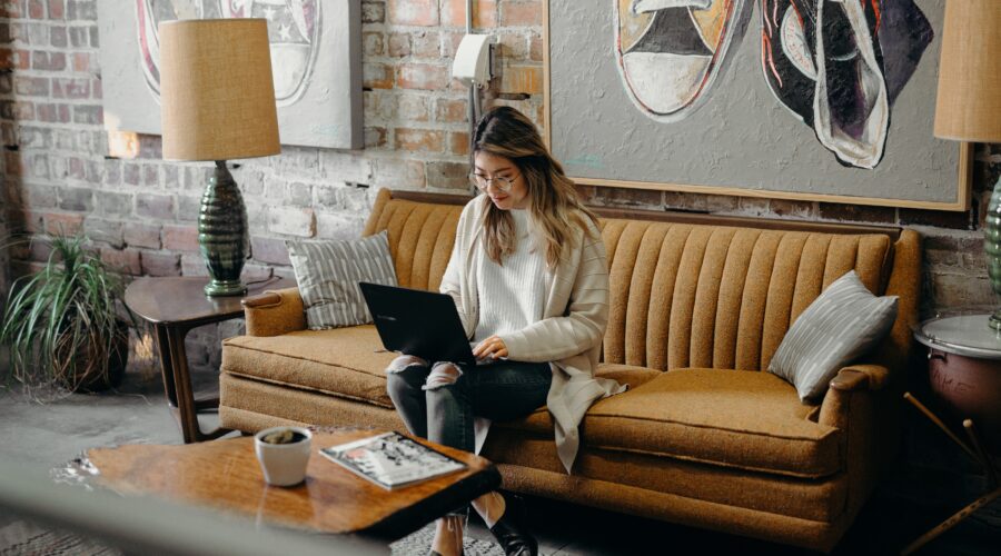 woman typing on a laptop