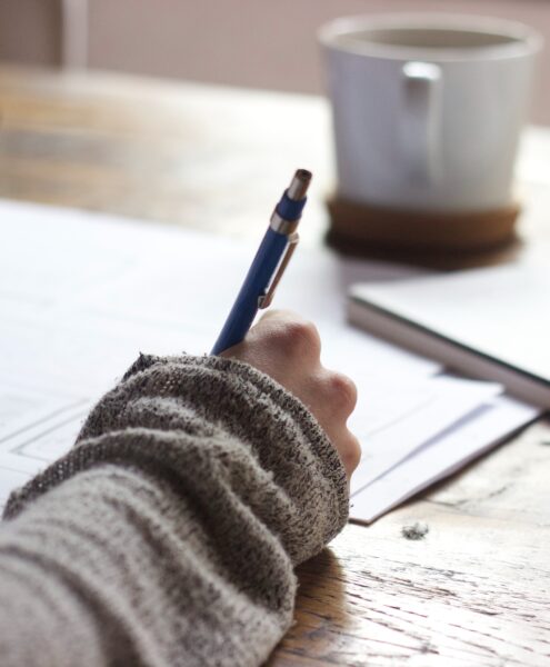 woman taking notes