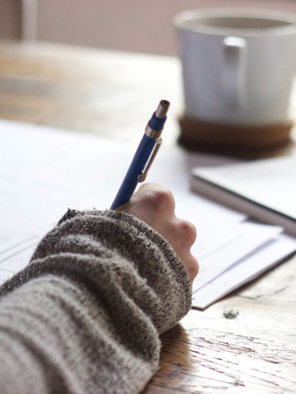 woman taking notes