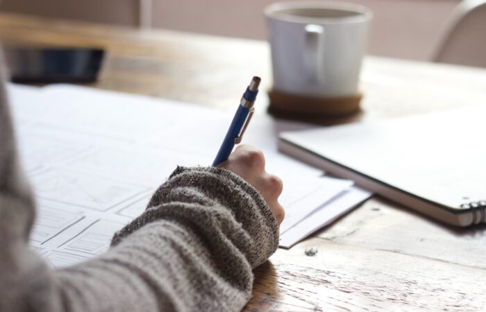 woman taking notes