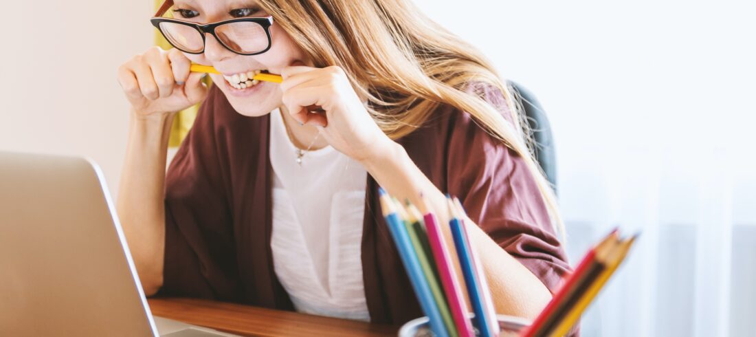 frustrated student biting pencil, wanting to drop that class