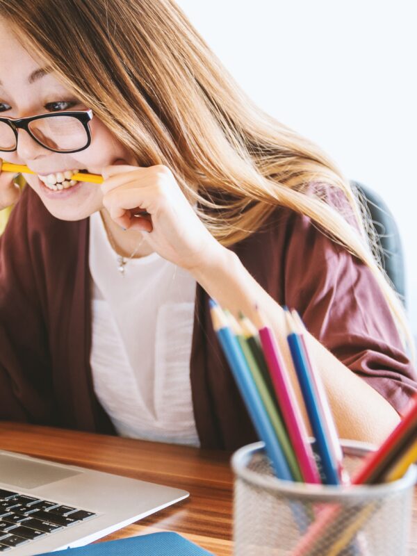 frustrated student biting pencil, wanting to drop that class