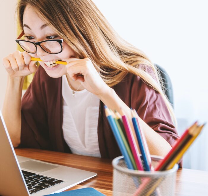 frustrated student biting pencil, wanting to drop that class