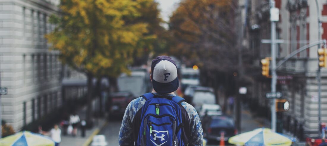 student preparing for his daily commute