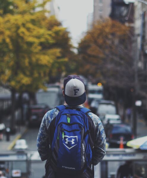 student preparing for his daily commute