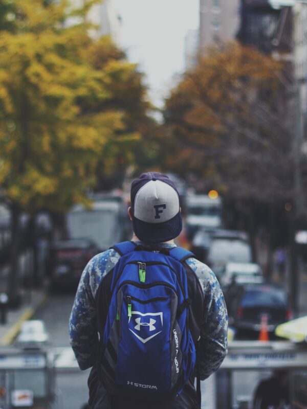 student preparing for his daily commute