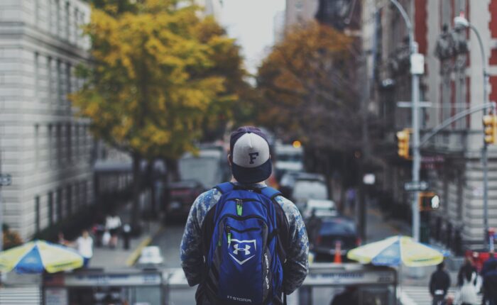 student preparing for his daily commute