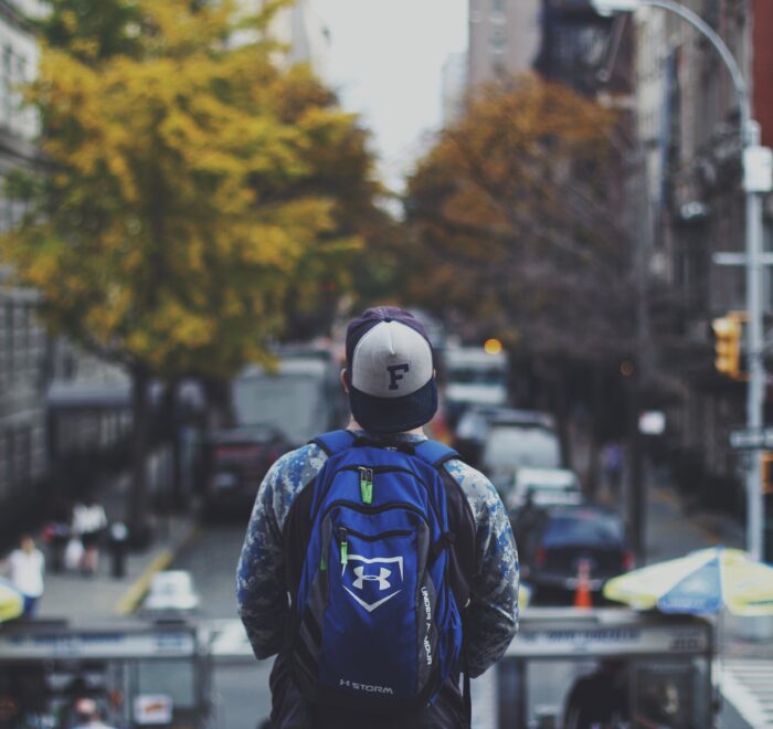 student preparing for his daily commute