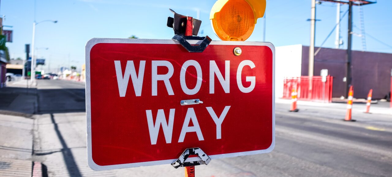 sign that says "wrong way"