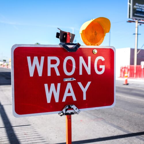 sign that says "wrong way"