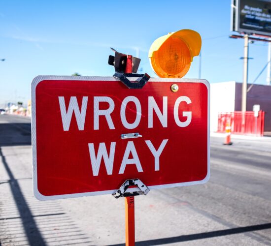 sign that says "wrong way"