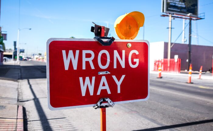 sign that says "wrong way"