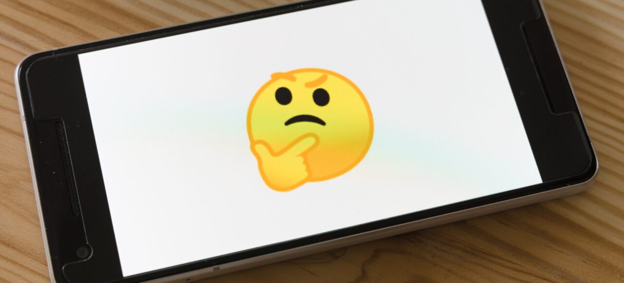 not sure about going to college?, phone with thinking emoji