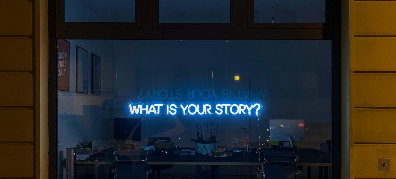 a sign that says "what's your story"