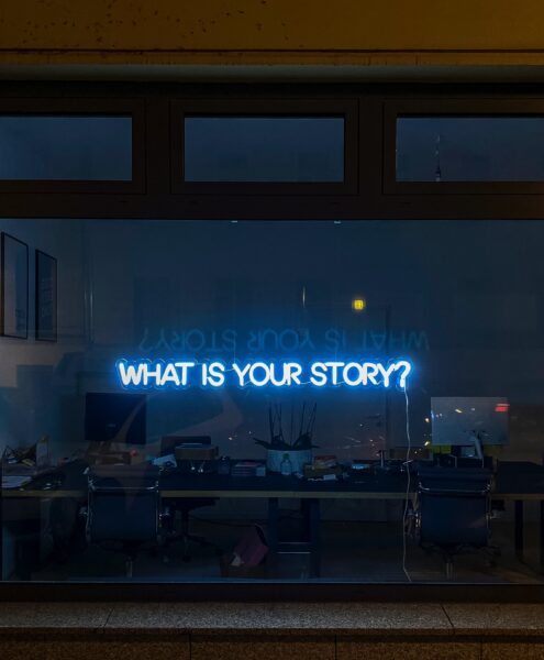 a sign that says "what's your story"