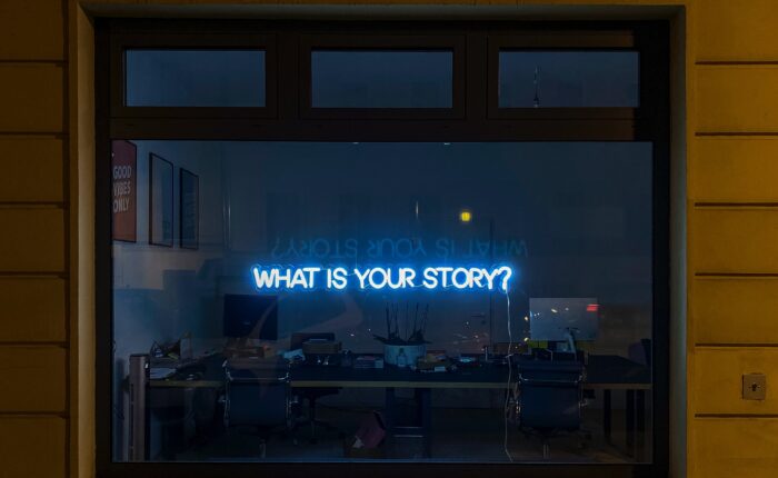 a sign that says "what's your story"