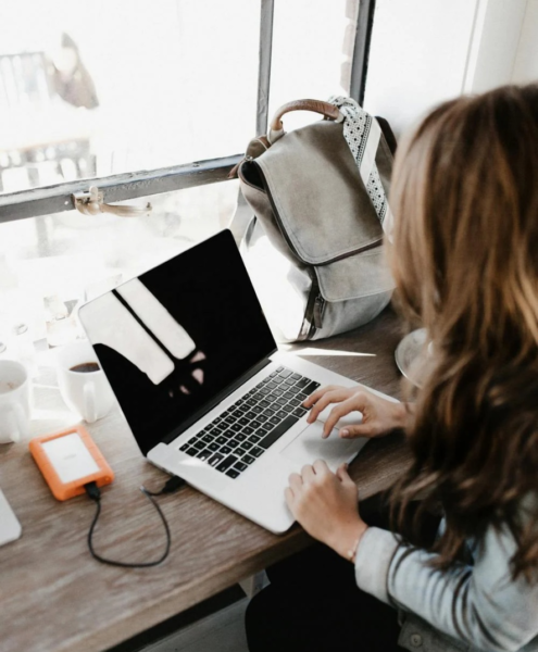 A professional grant writer works at her desk