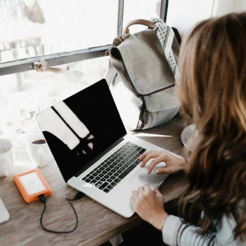 A professional grant writer works at her desk