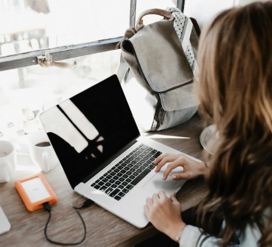 A professional grant writer works at her desk