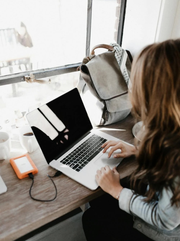 A professional grant writer works at her desk