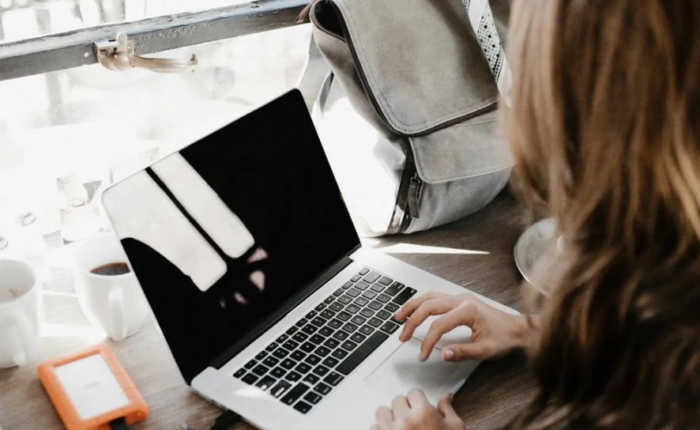 A professional grant writer works at her desk