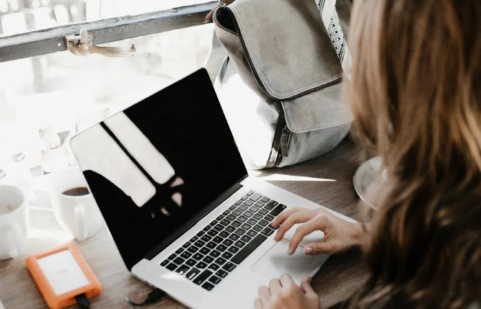 A professional grant writer works at her desk